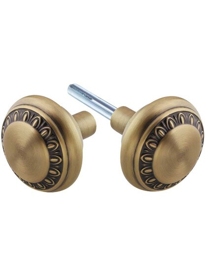 Pair of Ovolo Door Knobs in Antique Brass.
